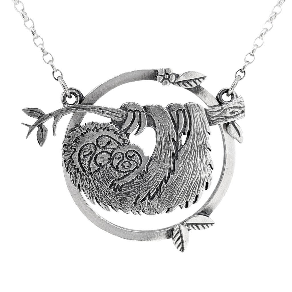 Cuddles with Momma. Sloth